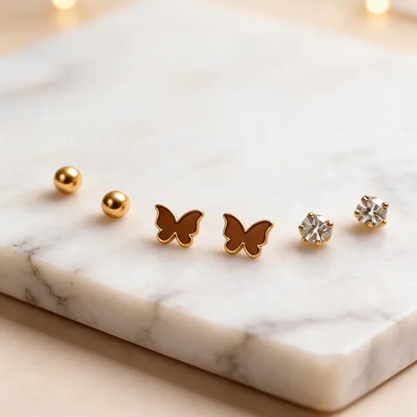 Golden_Alloy_Butterfly_And_Stone_Stud_Earrings_Set_For_Women