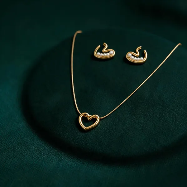 Golden_Alloy_Heart_Pendant_Necklace_And_Earrings_Set_For_Women