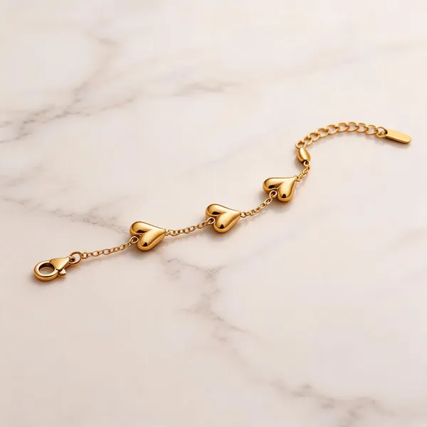 Golden_Alloy_Triple_Heart_Charm_Bracelet_For_Women
