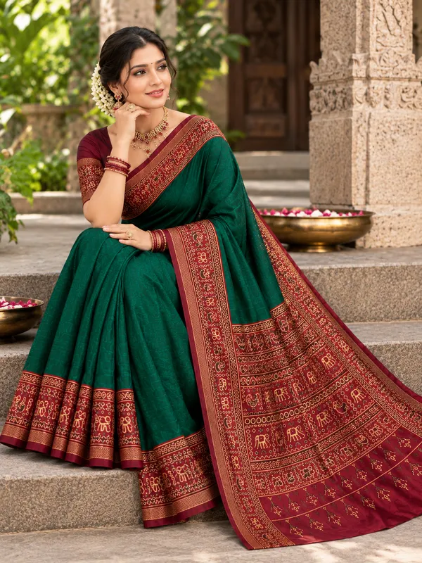 Traditional_Patola_Border_Saree_with_Plain_Body_Dola_Silk_Saree_-_Green