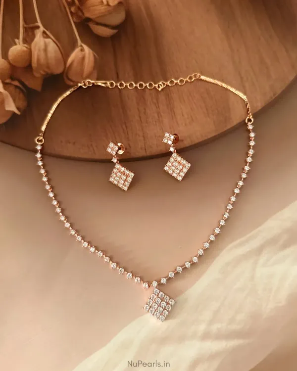 Rose_Gold_Amrit_Geometrical_Ad_Necklace_With_Earrings