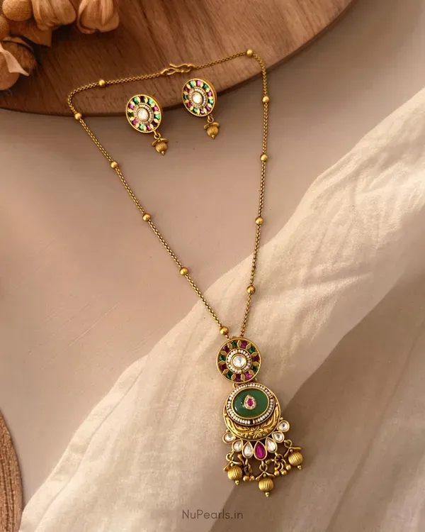 Vamika_Traditional_Antique_Gold_Pendant_Set_With_Green_Pink_Stones_Beade