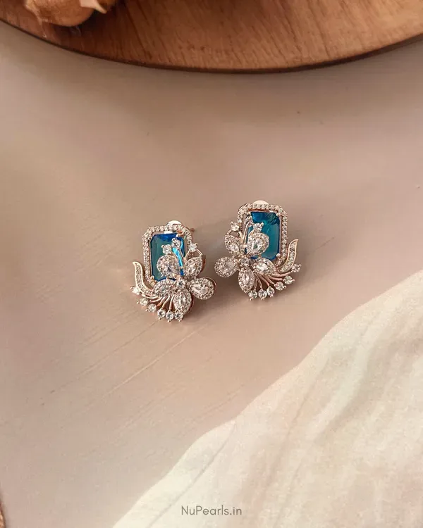 Light_Blue_Floral_Studs_18k_Rose_Gold_Plated_American_Diamond_Studded_Par_More