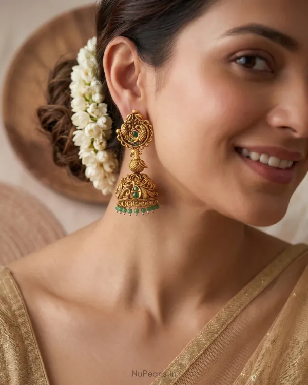 Hira_Temple_Jhumka_Earrings_With_Green_Stones_Antique_Gold_Finish