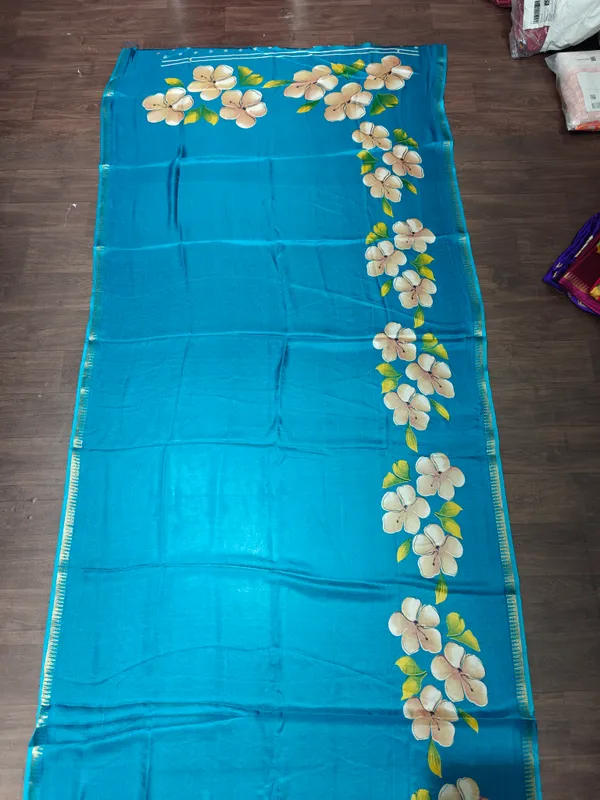 Turquoise_Blue_Printed_Saree_With_Blouse_Piece