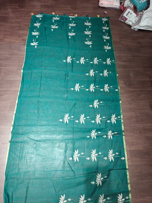 Teal_Green_Printed_Saree_With_Blouse_Piece