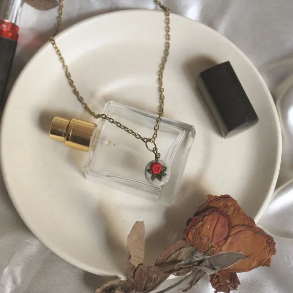 Red_Cotton_Embroidered_Rose_Branch_Hollow_Round_Pendant_Necklace_For_Women