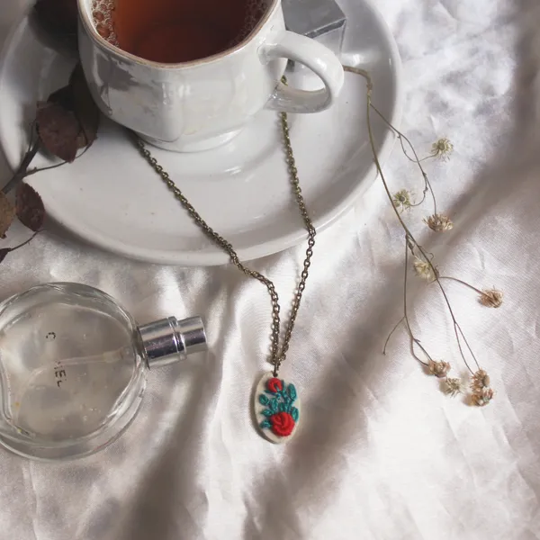 Red_Cotton_Embroidered_Rose_Vine_Hollow_Oval_Pendant_Necklace_For_Women