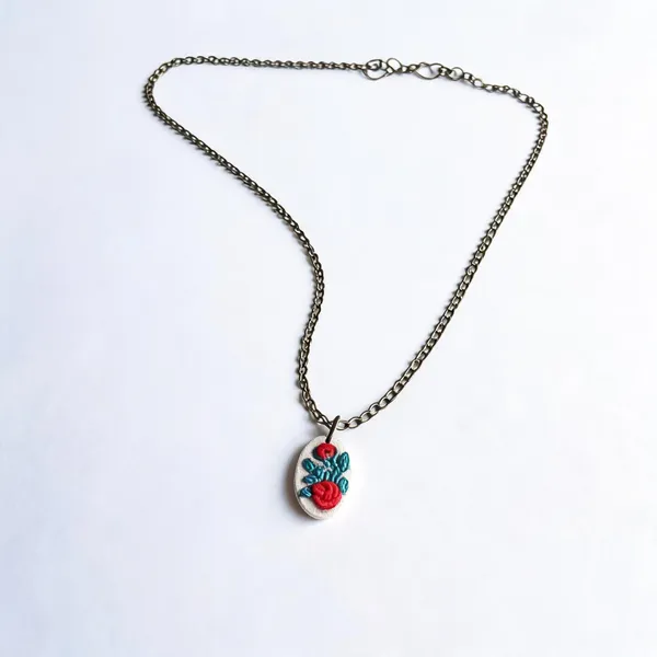 Red_Cotton_Embroidered_Rose_Vine_Hollow_Oval_Pendant_Necklace_For_Women