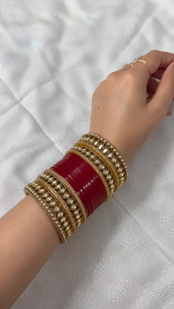 Maroon_Plastic_Kundan_Pearl_Accent_Embellished_Chura_Set_For_Women
