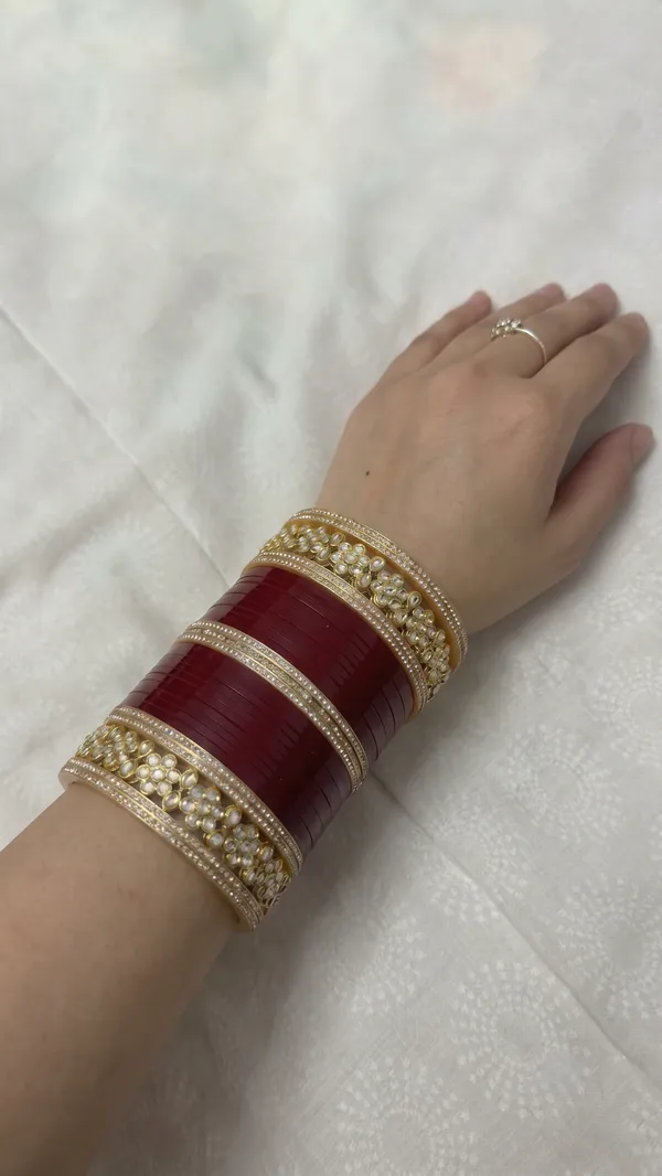 Maroon_Plastic_Gold-Tone_Pearl_Embellished_Chura_Set_For_Women