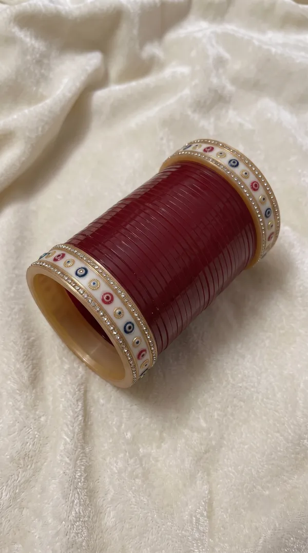 Maroon_Plastic_Red_Enamel_Embellished_Chura_Set_For_Women
