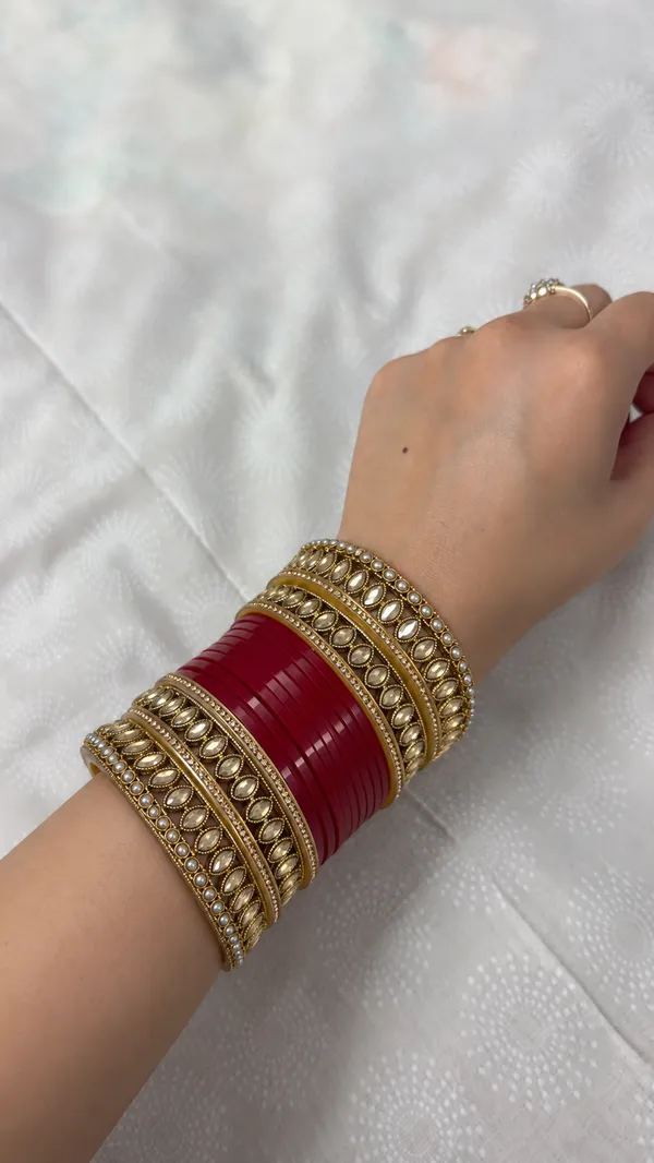 Maroon_Plastic_Kundan_Pearl_Accent_Embellished_Chura_Set_For_Women