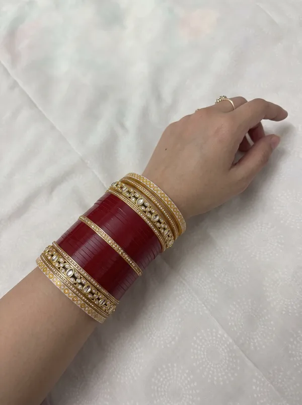 Maroon_Plastic_Gold-Tone_Teardrop_Embellished_Chura_Set_For_Women