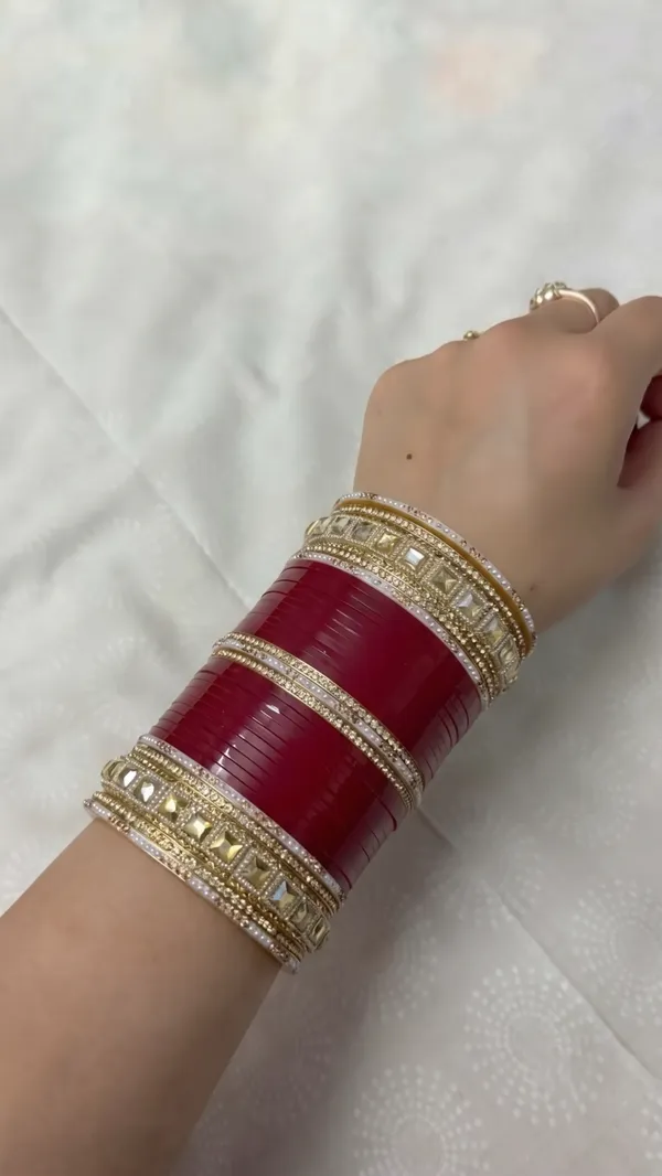 Maroon_Plastic_Gold-Tone_Embellished_Chura_Set_For_Women