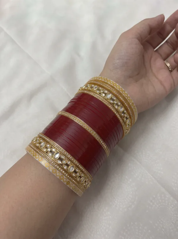 Maroon_Plastic_Gold-Tone_Teardrop_Embellished_Chura_Set_For_Women