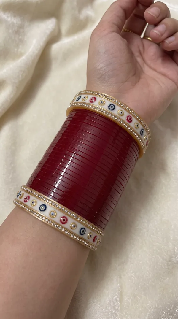 Maroon_Plastic_Red_Enamel_Embellished_Chura_Set_For_Women