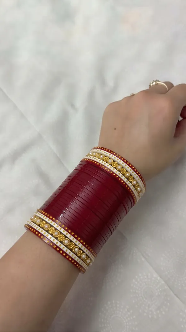Maroon_Plastic_Gold-Tone_Layered_Embellished_Chura_Set_For_Women