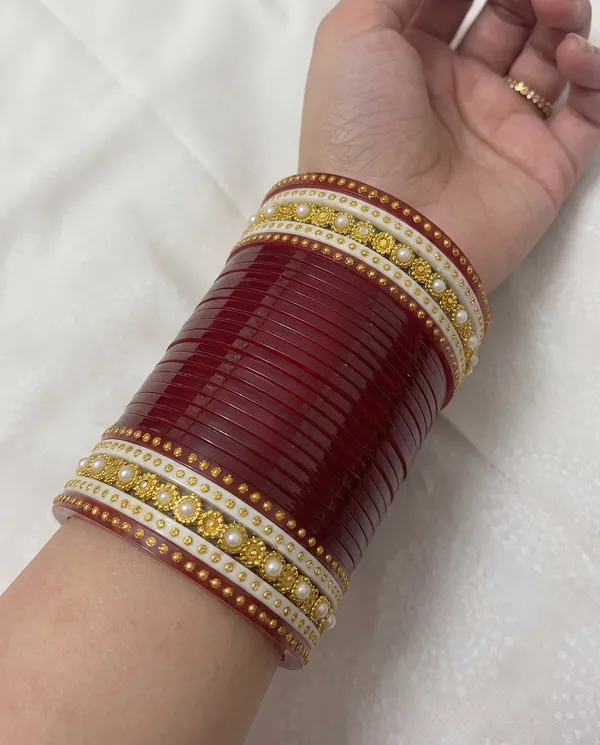 Maroon_Plastic_Gold-Tone_Layered_Embellished_Chura_Set_For_Women