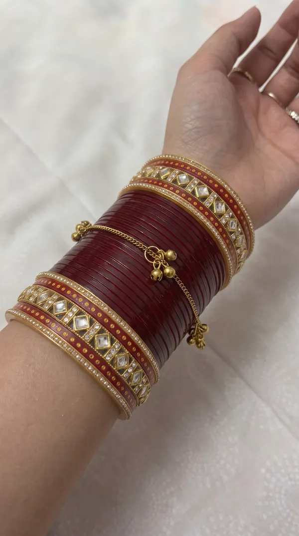 Maroon_Plastic_Gold-Tone_Embellished_Layered_Chura_Set_For_Women
