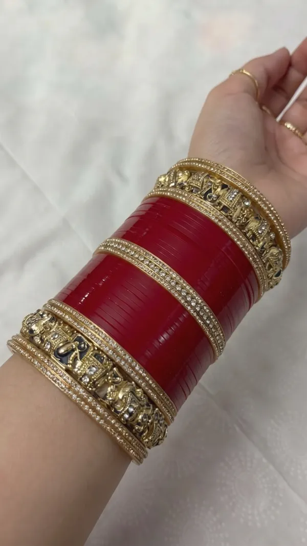 Maroon_Plastic_Gold_Tone_Embellished_Chura_Set_For_Women