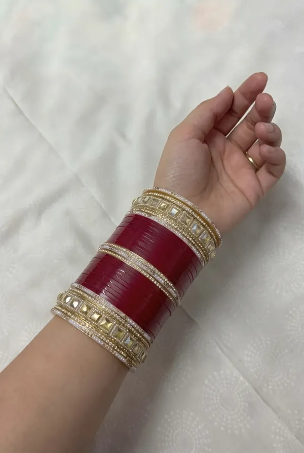 Maroon_Plastic_Gold-Tone_Embellished_Chura_Set_For_Women