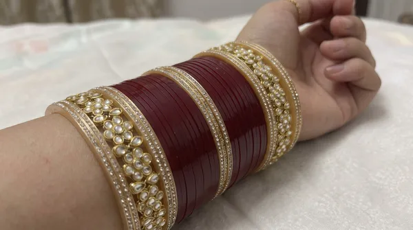 Maroon_Plastic_Gold-Tone_Pearl_Embellished_Chura_Set_For_Women