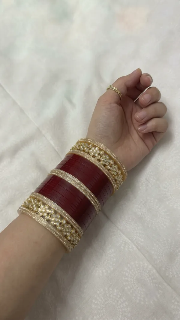 Maroon_Plastic_Gold-Tone_Pearl_Embellished_Chura_Set_For_Women
