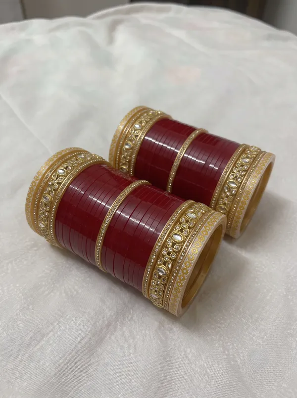 Maroon_Plastic_Gold-Tone_Teardrop_Embellished_Chura_Set_For_Women