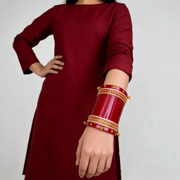 Maroon_Plastic_Bridal_Gold-Tone_Embellished_Chura_Set_For_Women