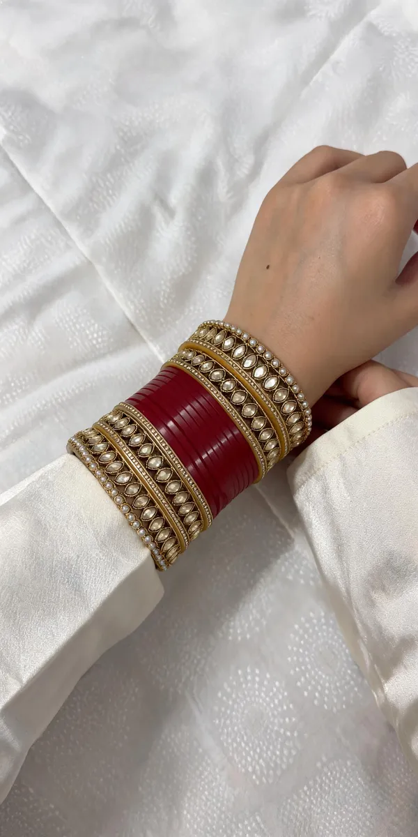 Maroon_Plastic_Kundan_Pearl_Accent_Embellished_Chura_Set_For_Women