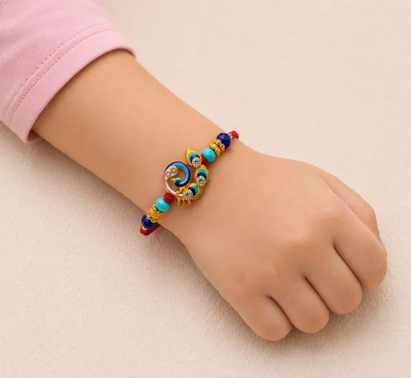 Peacock_Design_Rakhi_With_Rhinestones_And_Beads