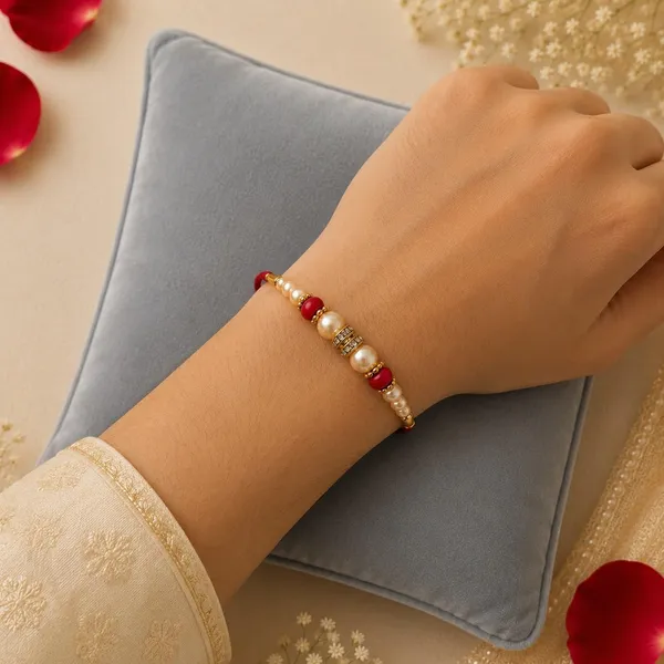 Rakhi_Set_With_Pearl_Beads_And_Crystal_Centerpiece