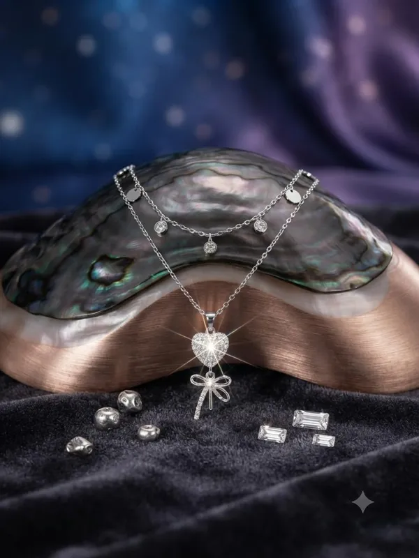 Layered_Necklace_With_Heart_And_Bow_Pendant