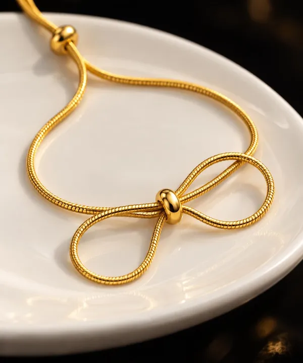 SHANKHRAJ_MALL_Gold_Bow_Bracelet,_Adjustable_Snake_Chain_with_Bead_Accent