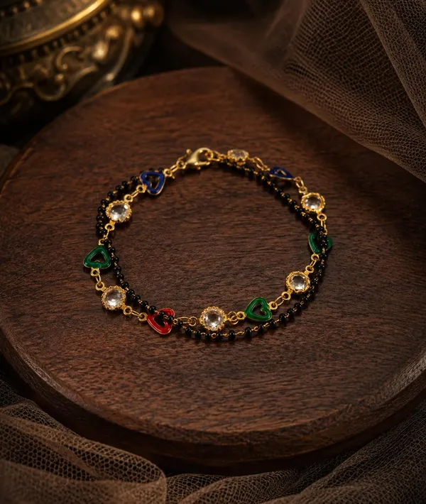 Black_Bead_Mangalsutra_Bracelet_with_Gold_Charms_(A665)