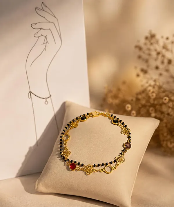 Black_Bead_Mangalsutra_Bracelet_with_Gold_Charms_(A666)