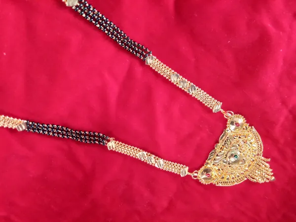 Women_gold_plated_Stylish_Mangalsutra_chain_(HAR-_SENTRO_PENDAL-SUNIL_3_LINE)