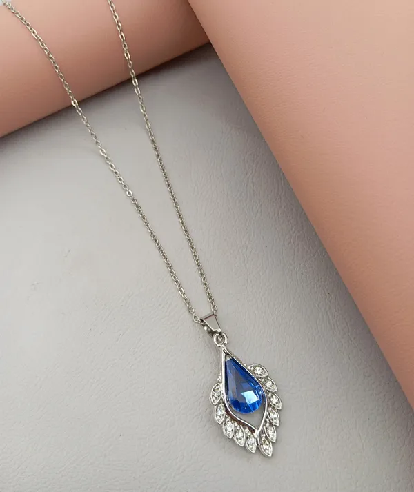 SHANKHRAJ_MALL_Crystal_Bow_Pendant_Necklace_with_Pink_Opal_Square_Stone,_Chrome_Chain,_Rhinestone_Accents_(CN19)