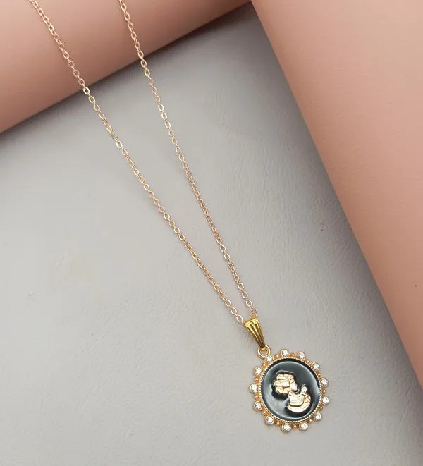 Crystal_Bow_Pendant_Necklace_with_Pink_Opal_Square_Stone,_Chrome_Chain,_Rhinestone_Accents_(CN13)