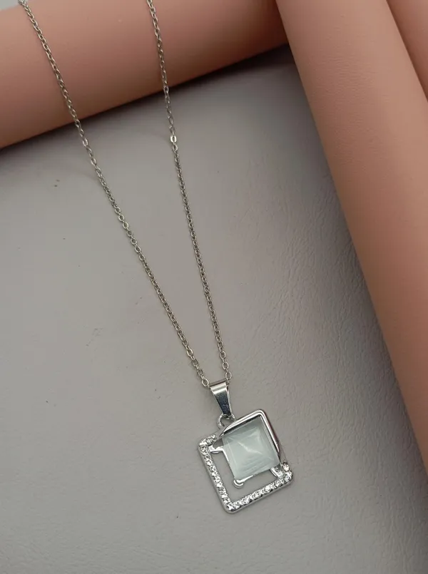 SHANKHRAJ_MALL_Crystal_Bow_Pendant_Necklace_with_Pink_Opal_Square_Stone,_Chrome_Chain,_Rhinestone_Accents_(CN36)