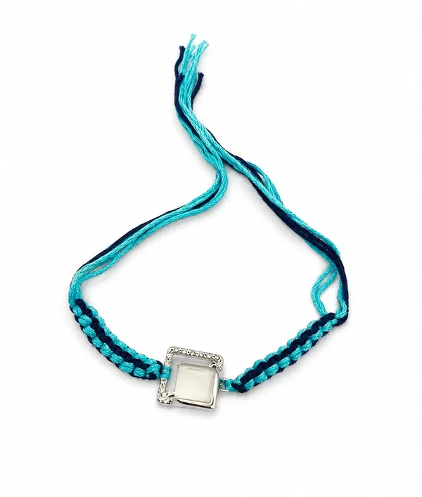 Blue_Designer_Rakhi_for_Brother_with_Braided_Thread_and_Decorative_Centre_Charm,_2,_A630