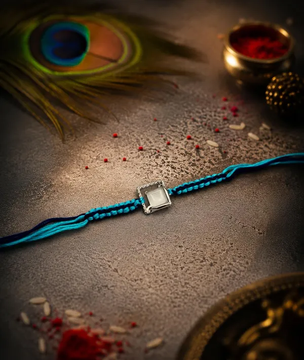 Blue_Designer_Rakhi_for_Brother_with_Braided_Thread_and_Decorative_Centre_Charm,_2,_A630