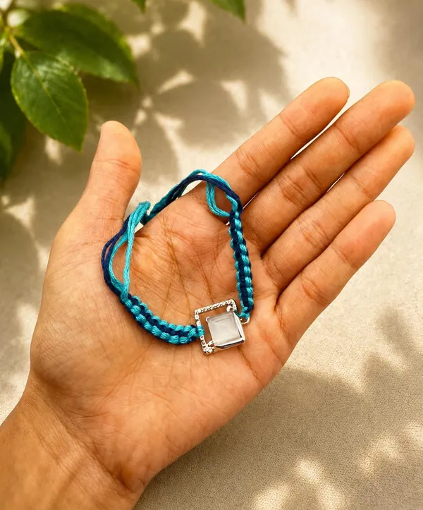 Blue_Designer_Rakhi_for_Brother_with_Braided_Thread_and_Decorative_Centre_Charm,_3,_A630