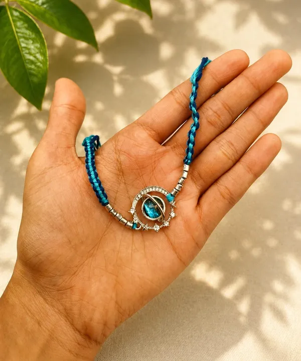 Blue_Designer_Rakhi_for_Brother_with_Braided_Thread_and_Decorative_Centre_Charm,_2,_A629