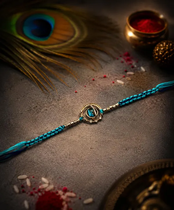 Blue_Designer_Rakhi_for_Brother_with_Braided_Thread_and_Decorative_Centre_Charm,_2,_A629