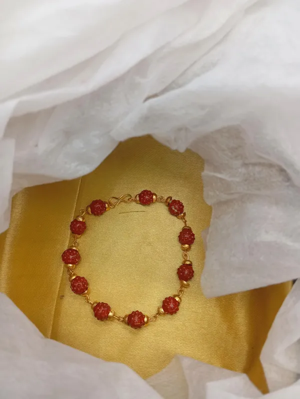 SHANKHRAJ_MALL_Handcrafted_Rudraksha_Beaded_Bracelet_with_Gold-Toned_Accents,_Red