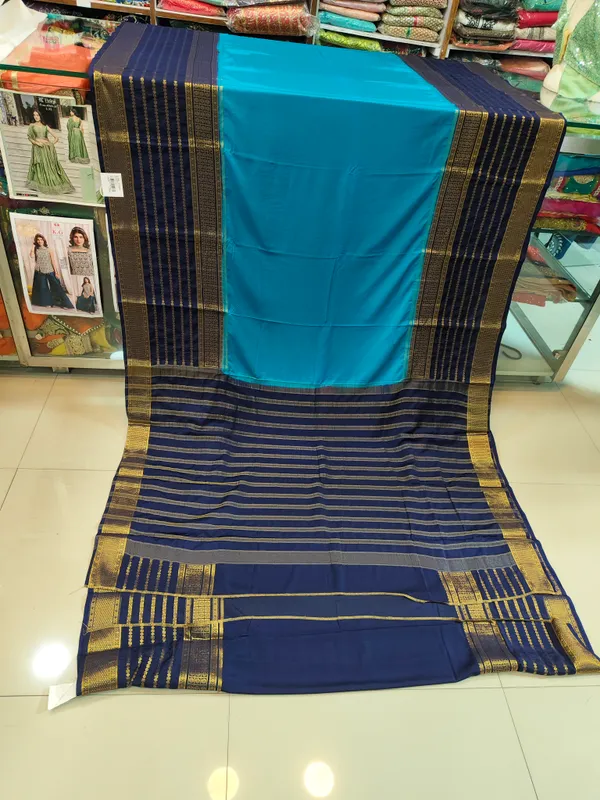 Turquoise_Blue_and_Navy_Blue_Traditional_Woven_Saree_with_Gold_Zari_Border