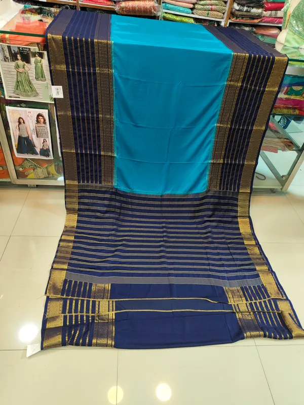 Turquoise_Blue_and_Navy_Blue_Traditional_Woven_Saree_with_Gold_Zari_Border