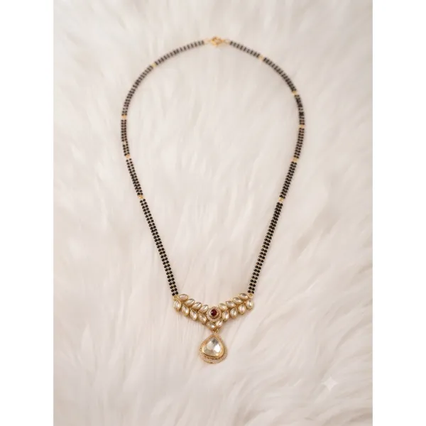 Kundan_Mangalsutra_With_Ruby_Pendant_Dark_Pink